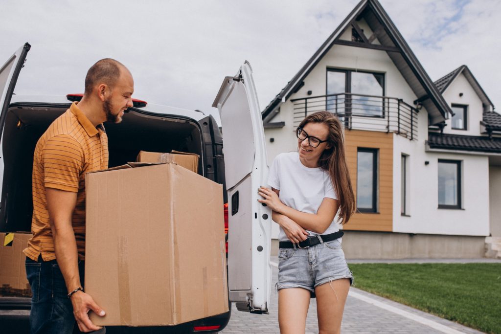 young-family-moving-into-their-new-house